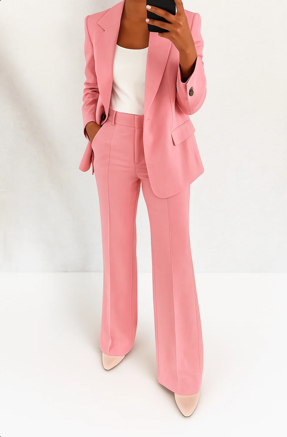 Sophisticated women's elegant blazer & wide-leg pant suit set, ideal for professional business meetings.