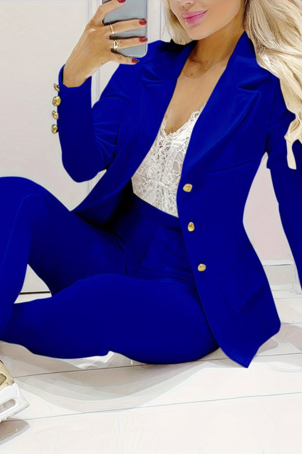 Sophisticated women's workwear suit: elegant two-piece blazer and trousers set.