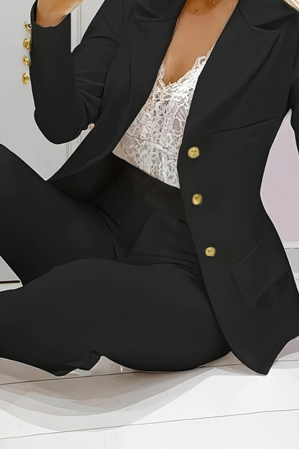 Elegant women's workwear set: two-piece blazer and pants suit, perfect for a tailored style.