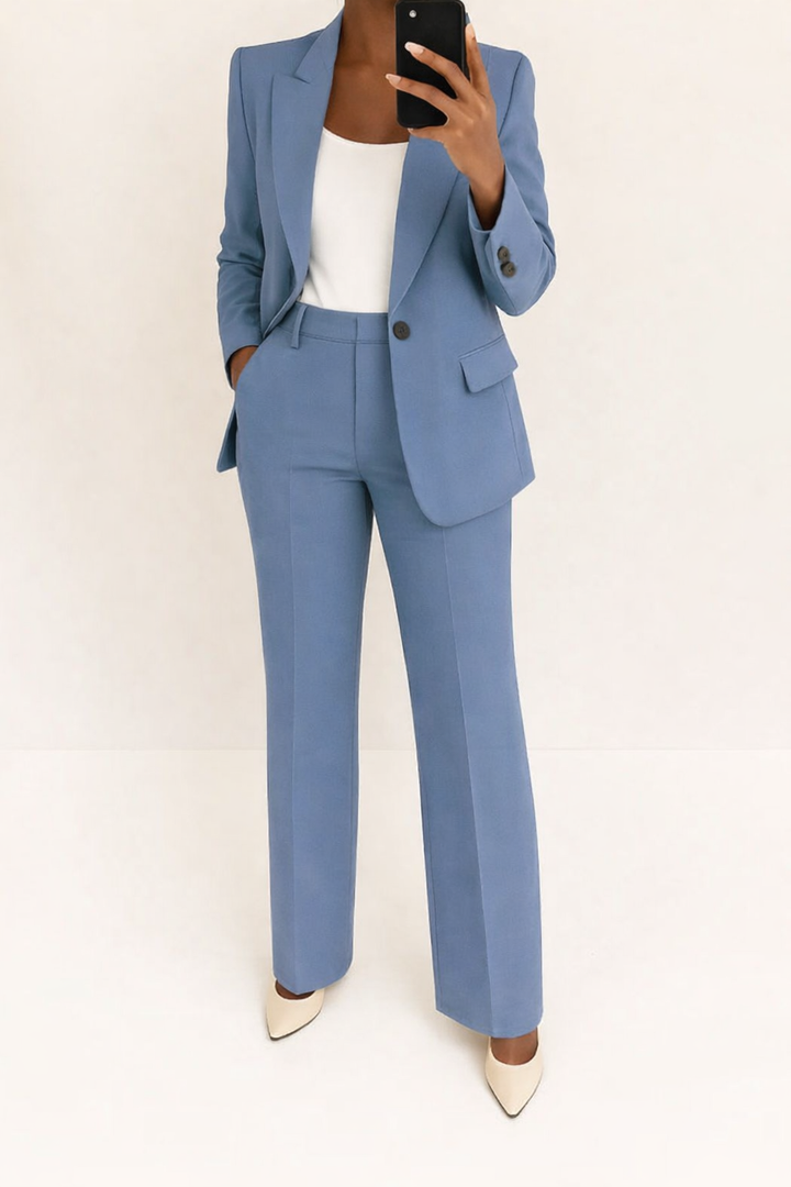 Elegant women's two-piece suit with a tailored blazer and wide-leg pants, perfect for business or formal wear.