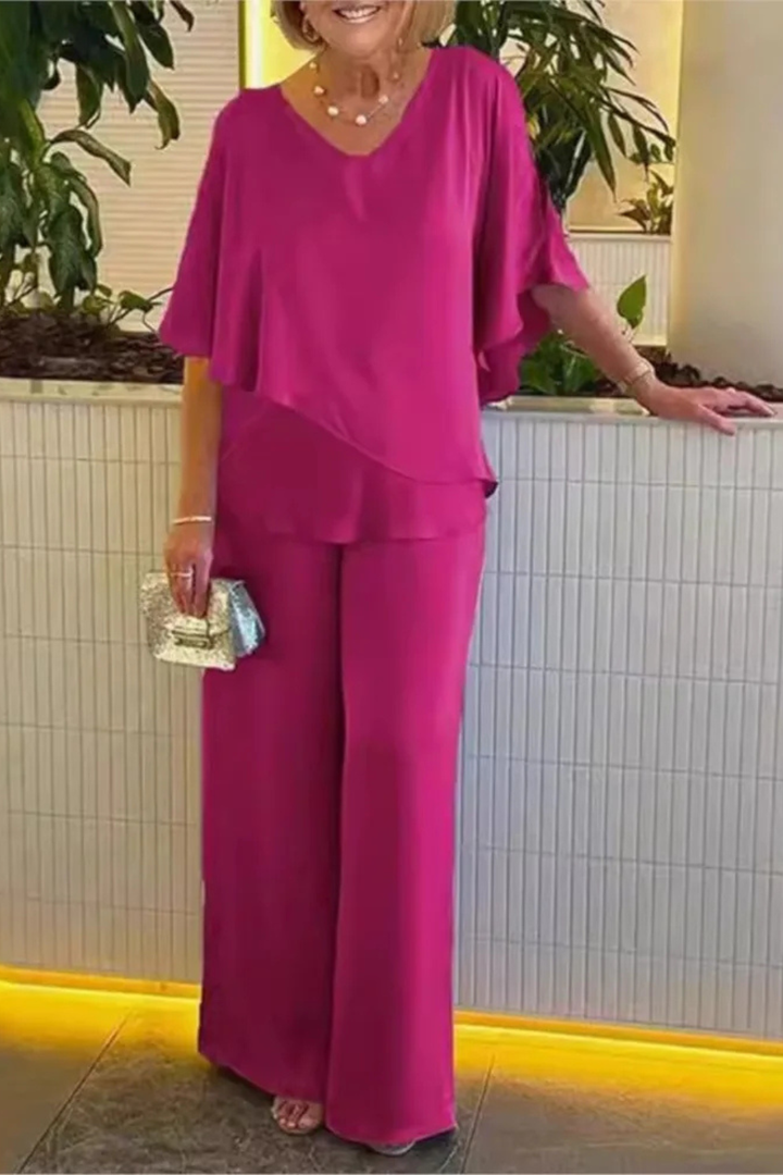 Versatile women's elegant two-piece set. Features a V-neck batwing top and stylish wide leg pants.