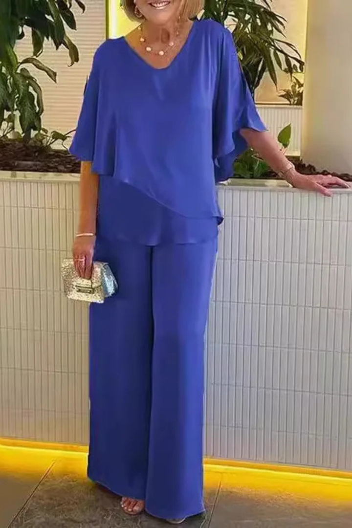 Casual chic women's two-piece set with V-neck batwing sleeves & comfy wide leg pants. Great for travel.