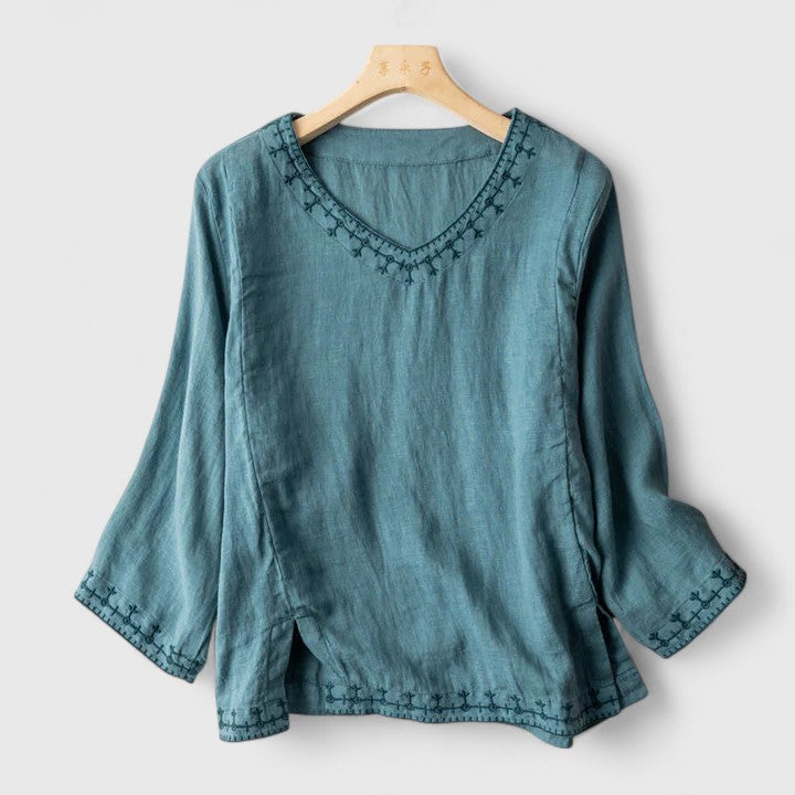 Elegant women's v-neck blouse, long sleeve, with a versatile and chic style, perfect for work or casual wear.