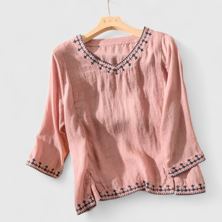 Sophisticated women's v-neck blouse, long sleeve. Versatile for work, evening, or chic casual outfits.