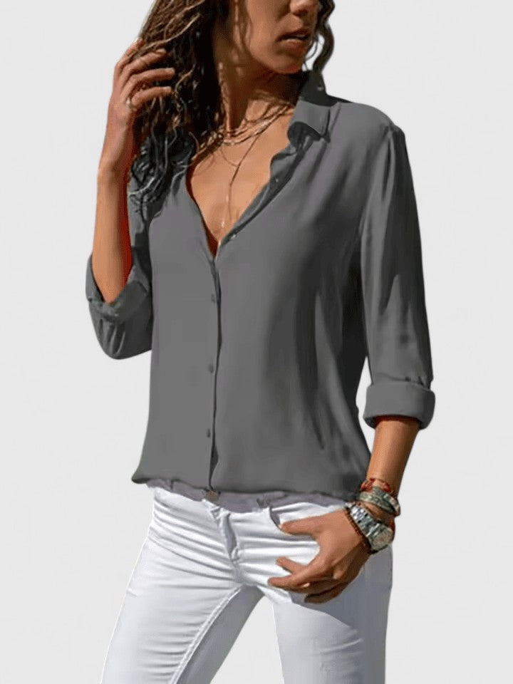Classic long-sleeve V-neck blouse for women, offering comfortable and elegant style for any occasion.