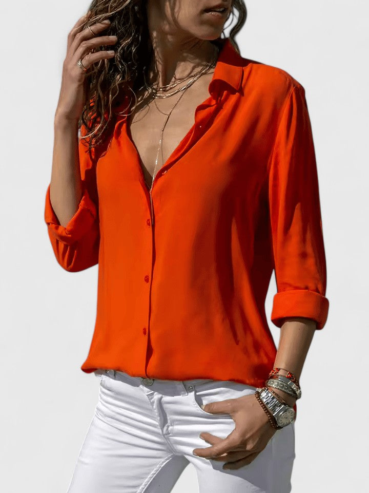 Comfortable women's V-neck top with a relaxed fit, a timeless wardrobe essential for daily wear.