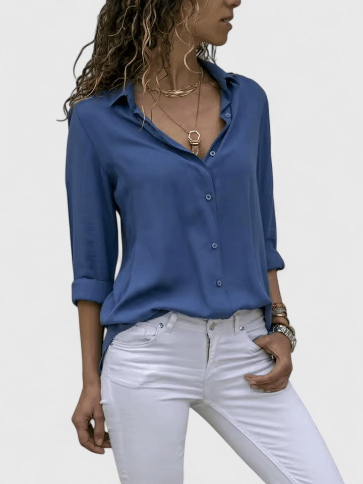 Classic women's long-sleeve V-neck blouse, combining comfort with versatile elegant style for apparel.