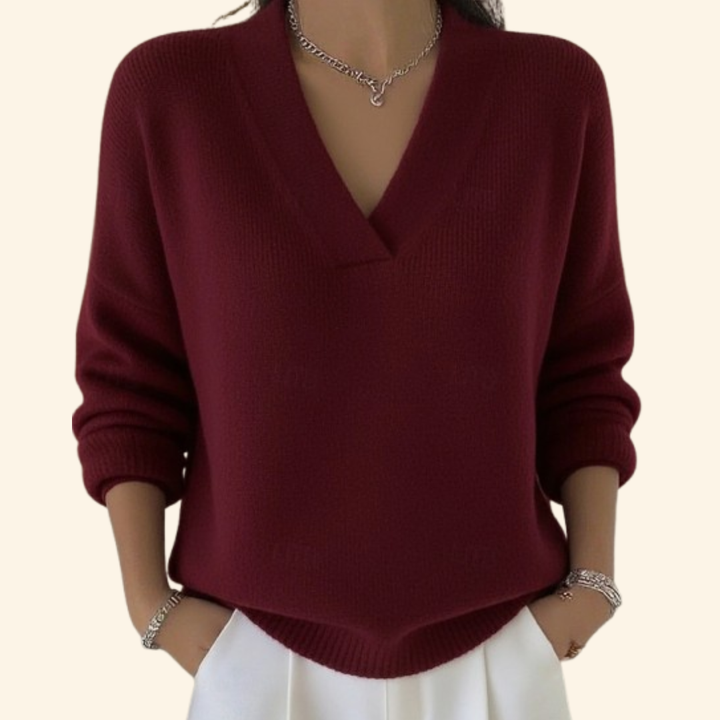 Elegant women's V-neck blouse with long sleeves, perfect for office or stylish casual wear.