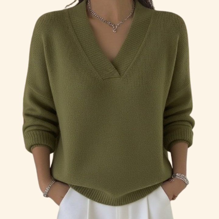 Stylish long sleeve V-neck blouse for women, offering an elegant look and comfortable relaxed fit.