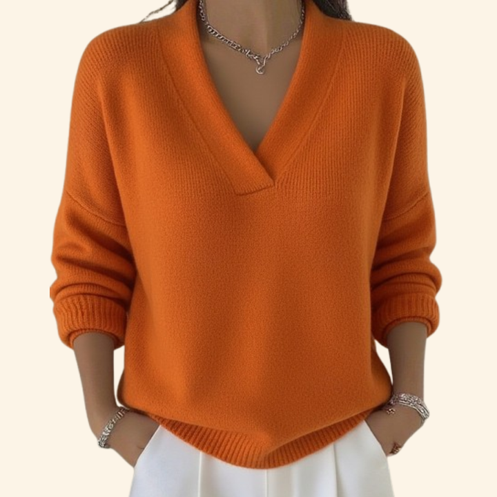 Chic women's V-neck blouse with a relaxed fit, ideal for effortless elegance in casual or office settings.