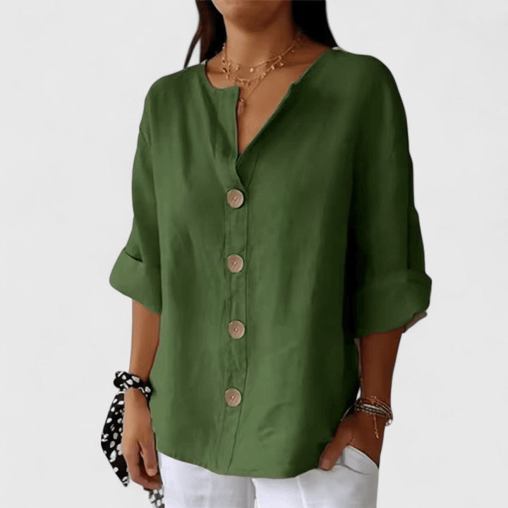 Versatile V-neck button-down blouse for women, ideal for casual outfits or chic office style.