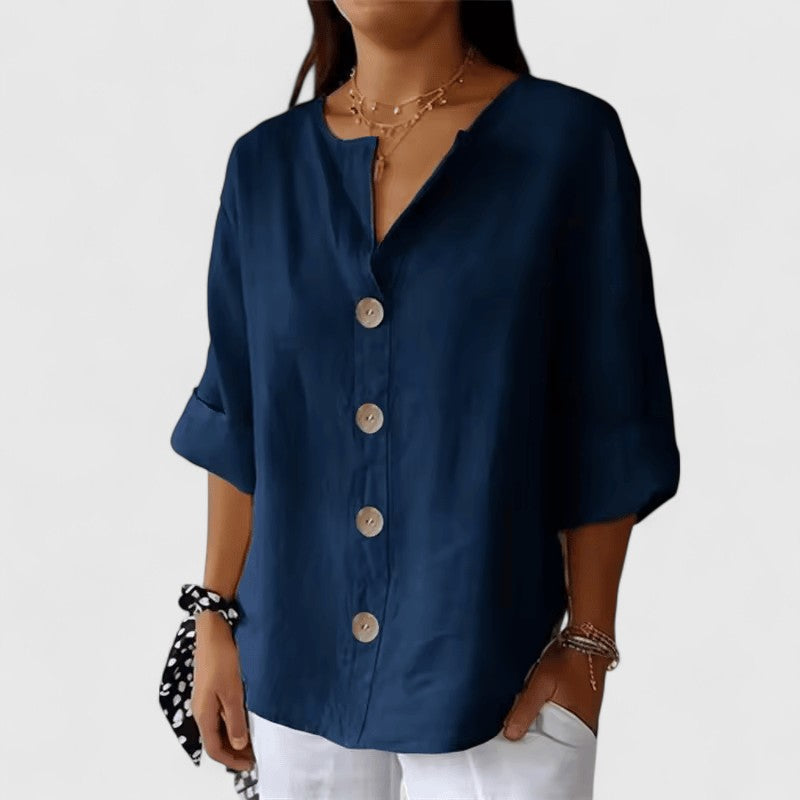 Women's long-sleeve V-neck button-down top, an elegant blouse for office, casual, or summer fashion.