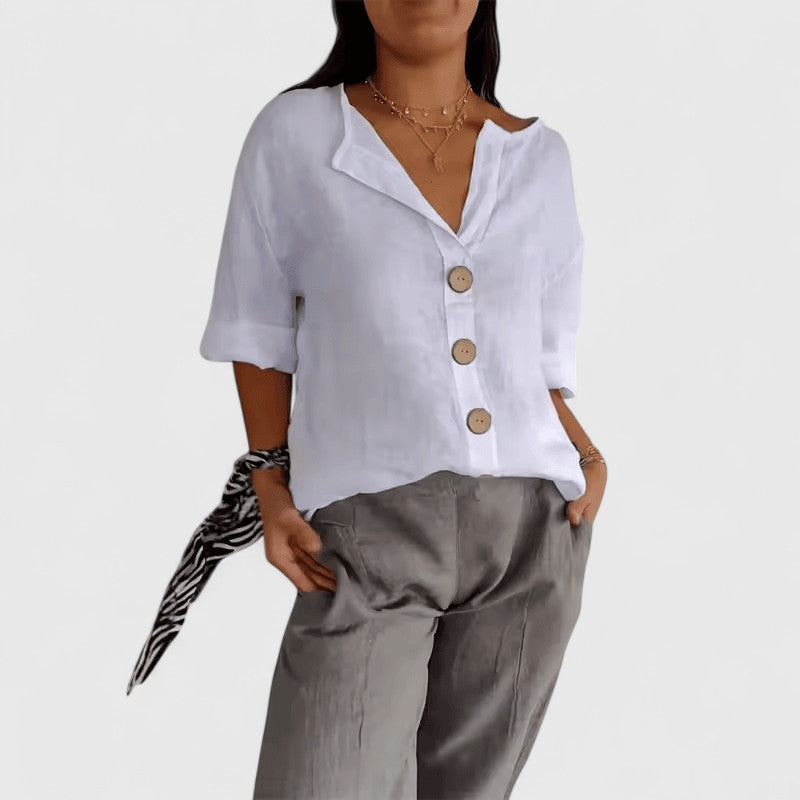 Elegant long-sleeve women's V-neck button-down top, perfect for office, casual wear, or summer versatility.
