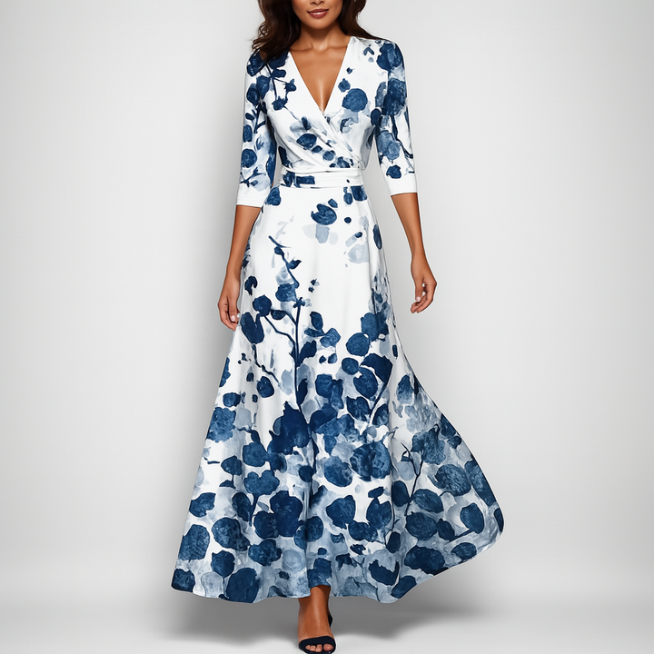 Flowy women's V-neck empire waist maxi dress with three-quarter sleeves. Available in red, white, beige, pink.