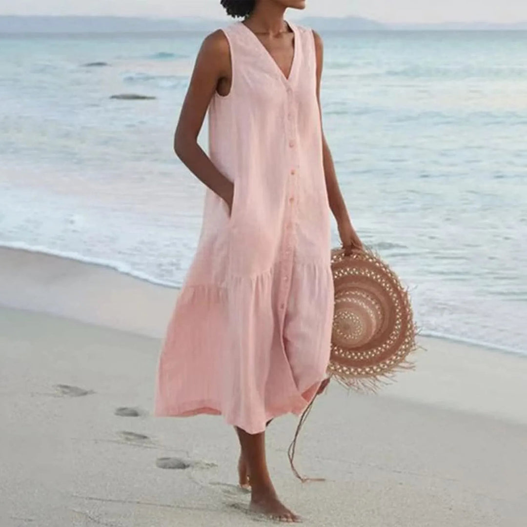 Flowy button-front midi sundress for women, featuring a V-neck, ideal for summer fashion, beach, or day wear.