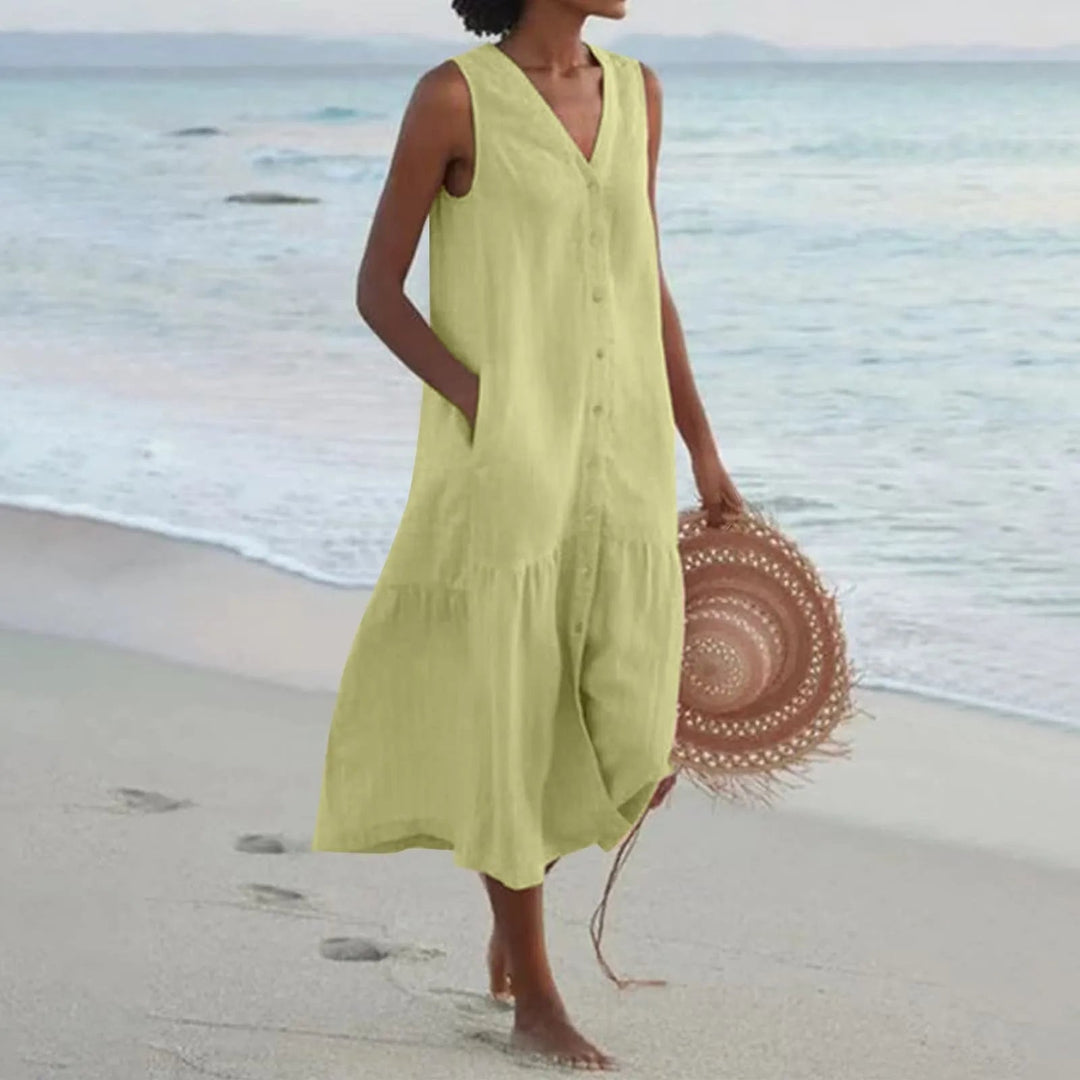 Comfortable women's summer V-neck midi sundress, flowy design with button front, great for casual elegance.