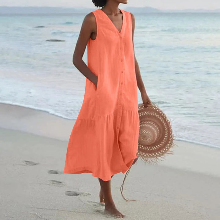 Chic women's V-neck flowy button-front midi sundress, perfect beach or vacation dress for summer fashion.