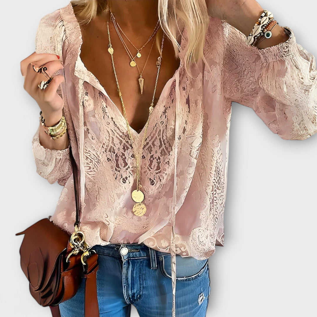 Feminine pink V-neck long sleeve lace blouse for women. Elegant and versatile top, perfect for chic office or date night.