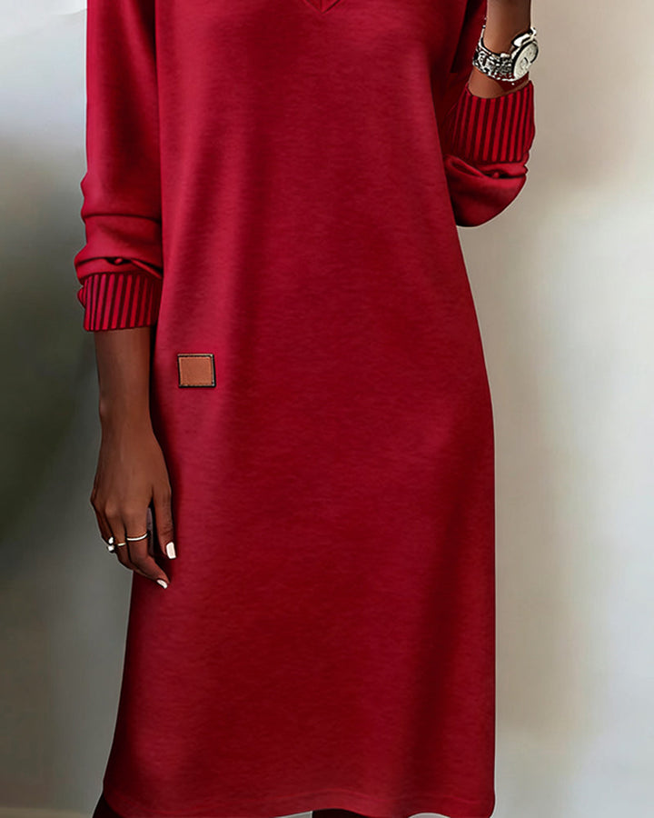 Stylish women's V-neck long sleeve midi dress for casual outings, a versatile and elegant fall fashion choice.