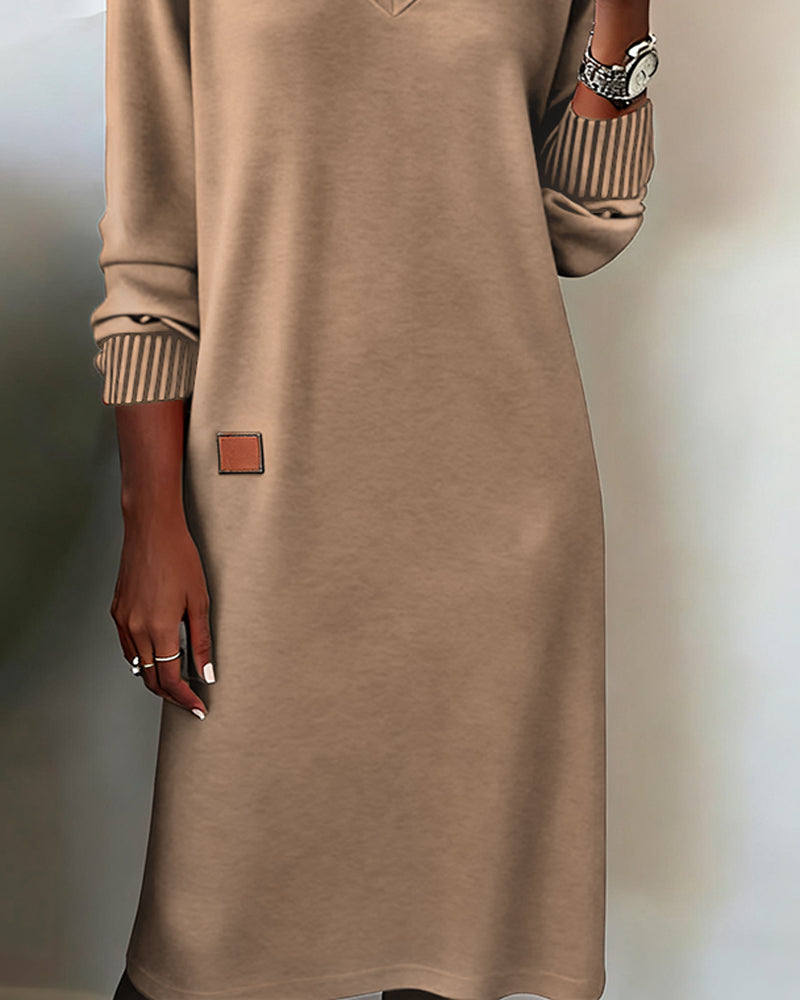 Versatile women's V-neck long sleeve midi dress for office & casual. Chic, modest, and perfect for fall/winter.