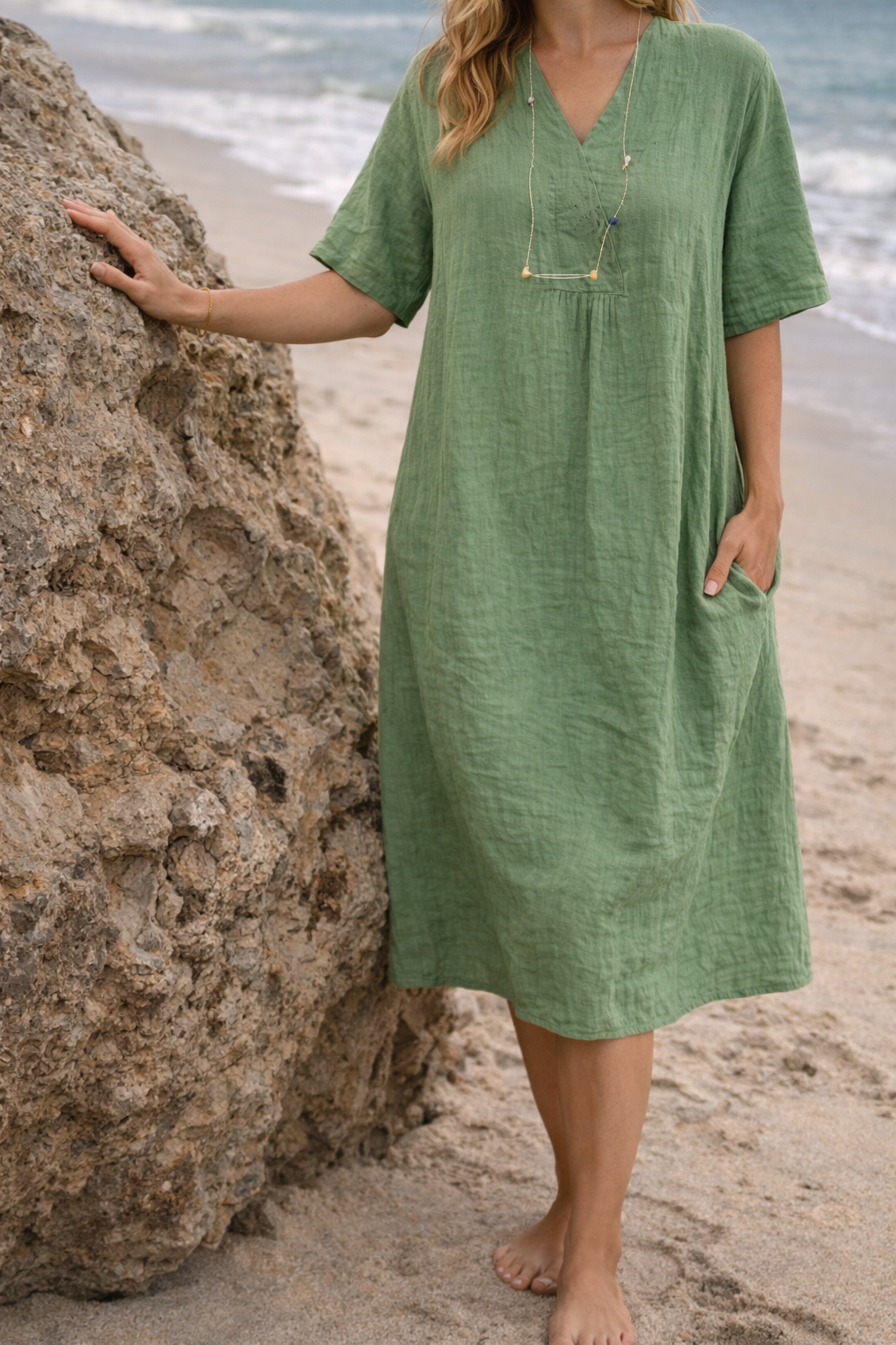 Flowy short-sleeve V-neck midi dress for women, offering a comfortable loose fit, ideal as a day dress.