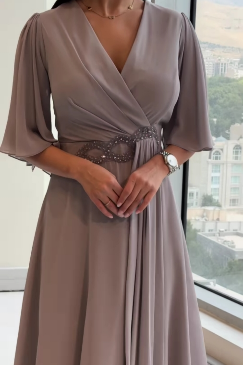 Stylish women's sleeveless V-neck maxi dress, highlighting its adjustable straps and comfortable, flowing silhouette.