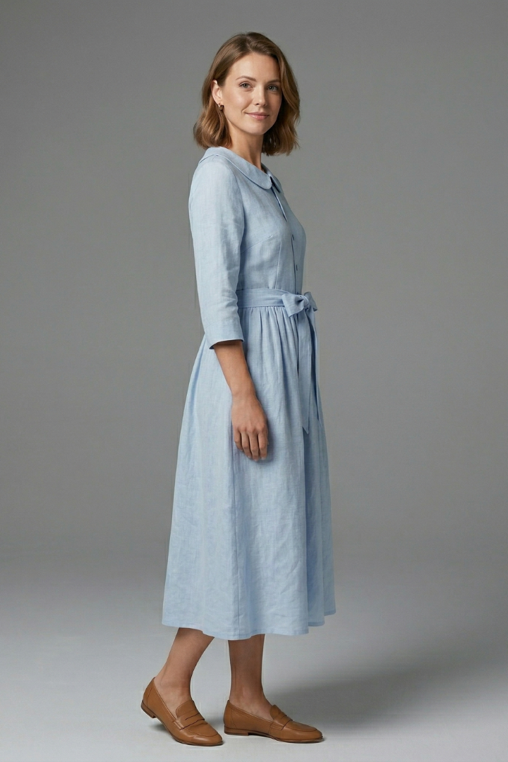 Flattering women's V-neck midi dress with a stylish waist tie. An elegant addition to women's fashion.
