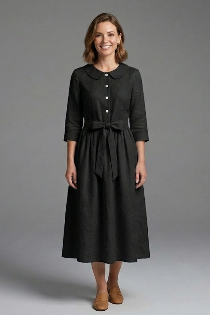 Women's midi dress with a flattering waist tie and elegant V-neck. Perfect for versatile, flowy summer fashion.