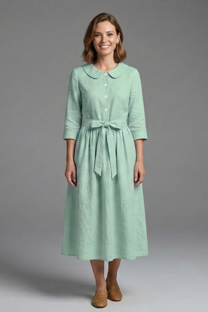 Classic women's V-neck midi dress with a waist tie. Elegant and versatile for casual or formal events.
