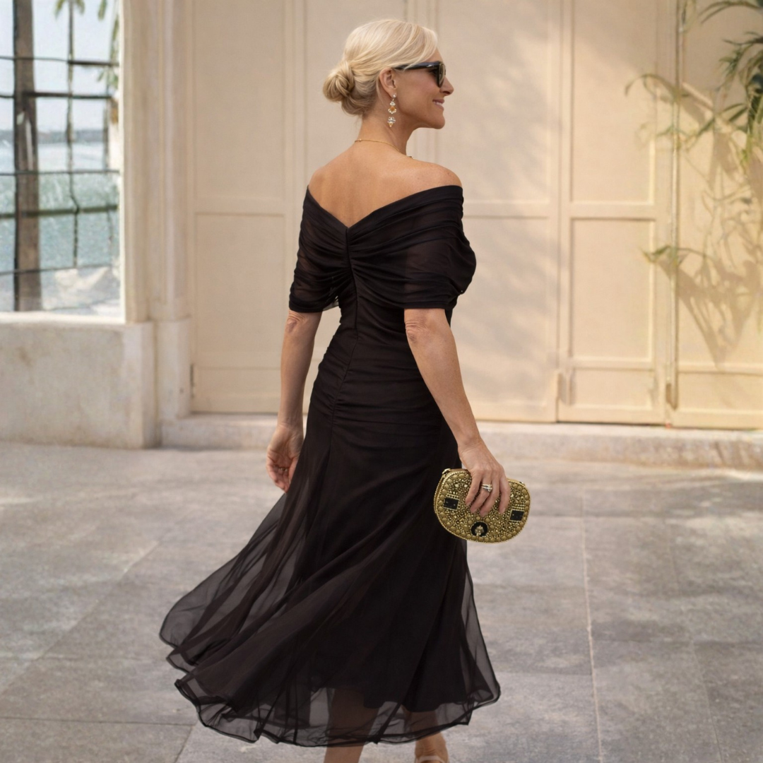 Occasion wear women's midi dress: V-neck, flowing flutter sleeves, perfect for elegant gatherings.