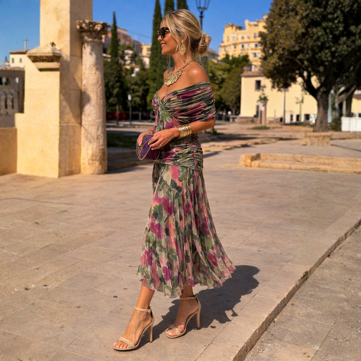 Occasion wear midi dress for women, featuring an elegant V-neck and graceful flutter sleeves.