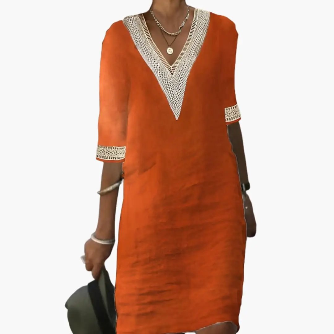 Relaxed fit V-neck shift midi dress for women. Ideal casual dress for summer vacation, everyday wear, or chic events.