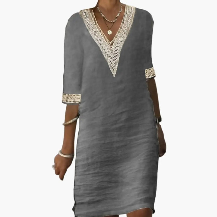 Chic plain V-neck shift midi dress for women. Versatile elegant dress for casual summer outings, travel, or fashion.