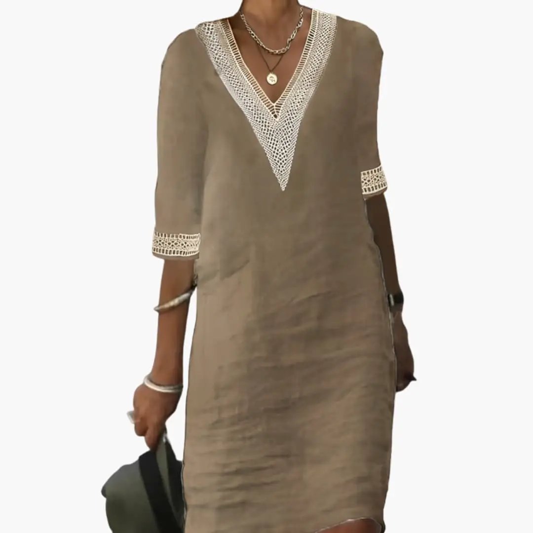 Women's elegant casual V-neck shift midi dress. A stylish and comfortable everyday summer dress with a relaxed fit.