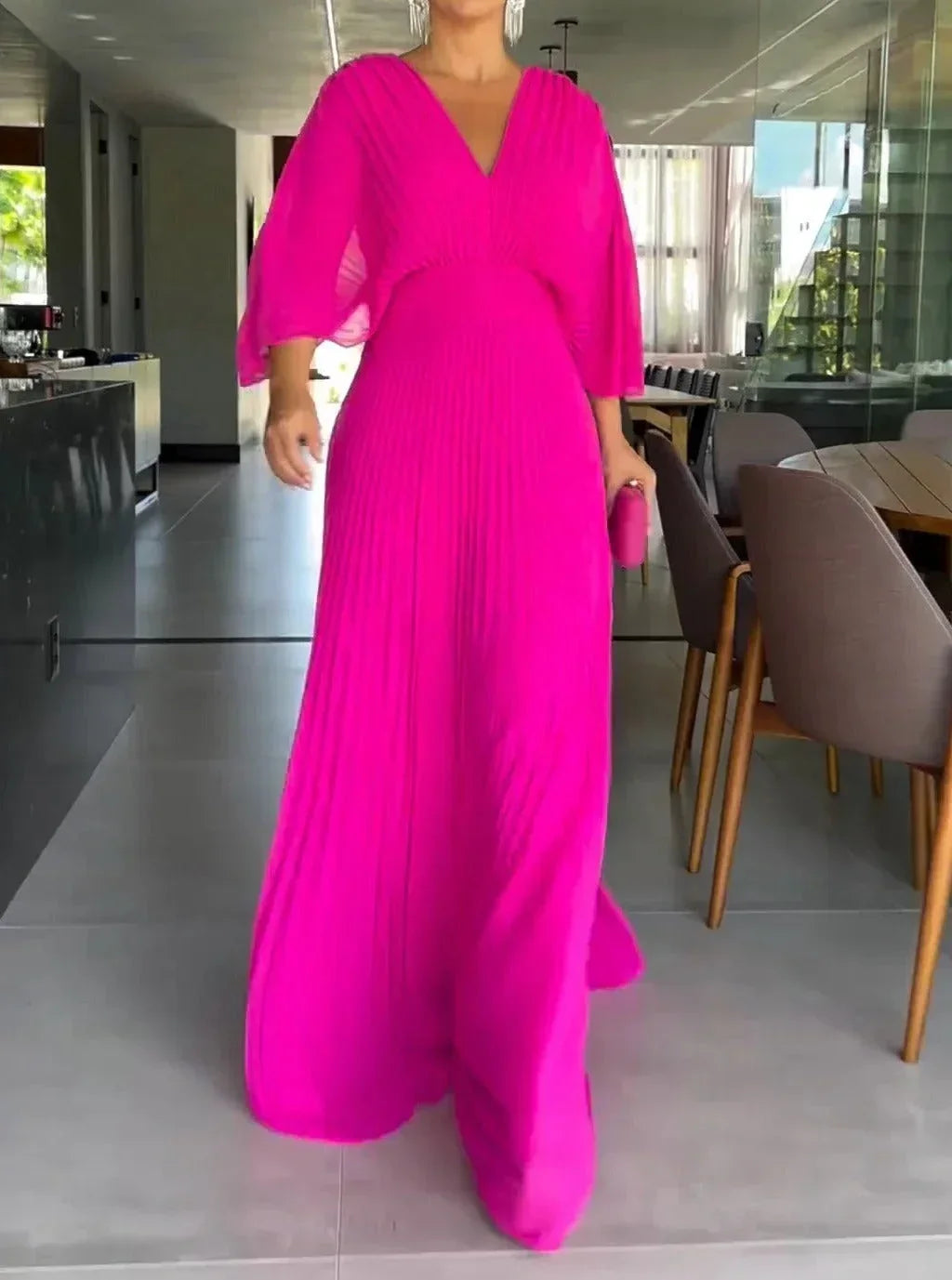 Women's comfortable V-neck pleated flowy kaftan maxi dress, an elegant choice for summer and relaxing vacation wear.