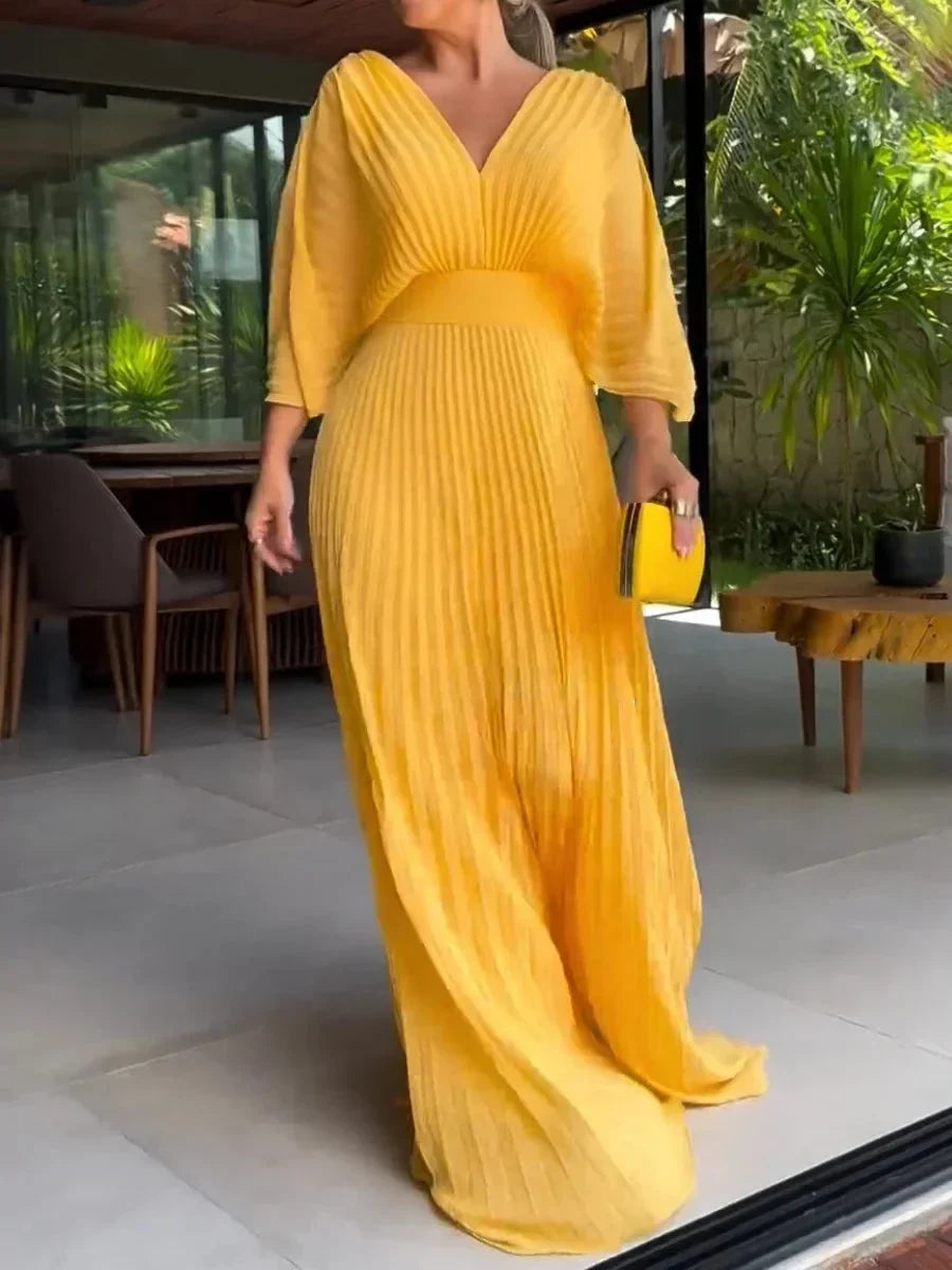 Women's V-neck kaftan maxi dress with elegant pleats & flowy design. Ideal for summer, vacation, & comfortable fashion.
