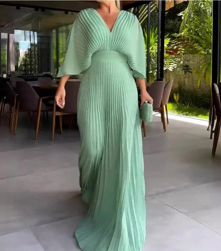 Flowy pleated kaftan maxi dress for women. Features a chic V-neck, perfect for elegant summer, vacation, & comfortable wear.