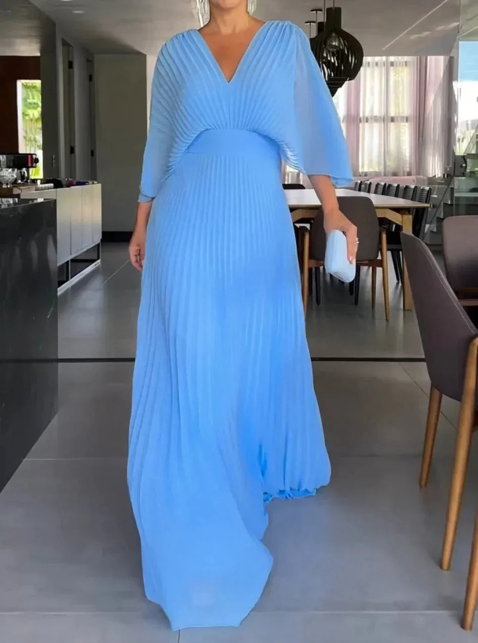 Women's elegant V-neck pleated flowy kaftan maxi dress. A versatile summer dress for vacation or comfortable daily wear.