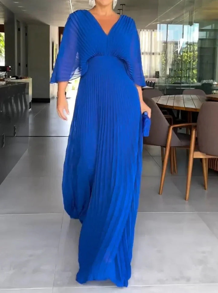 Lightweight flowy kaftan maxi dress with V-neck & pleats. Women's elegant summer, vacation, and comfortable occasion wear.
