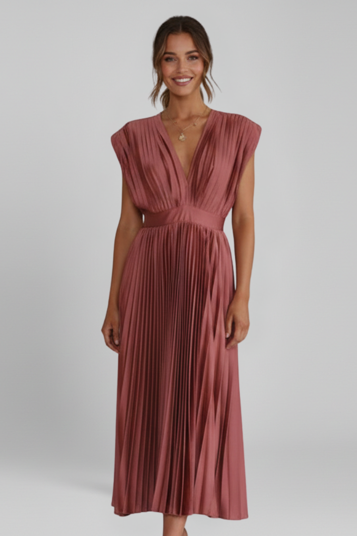 Women's long V-neck pleated dress for an elegant look. Modern midi skirt design, perfect for fashionistas.