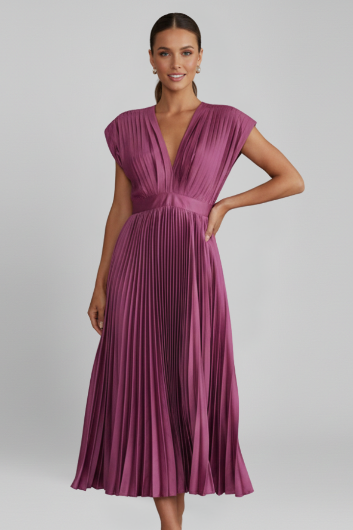 Beautiful women's V-neck pleated midi dress, combining comfort and elegant style. Ideal for all occasions.