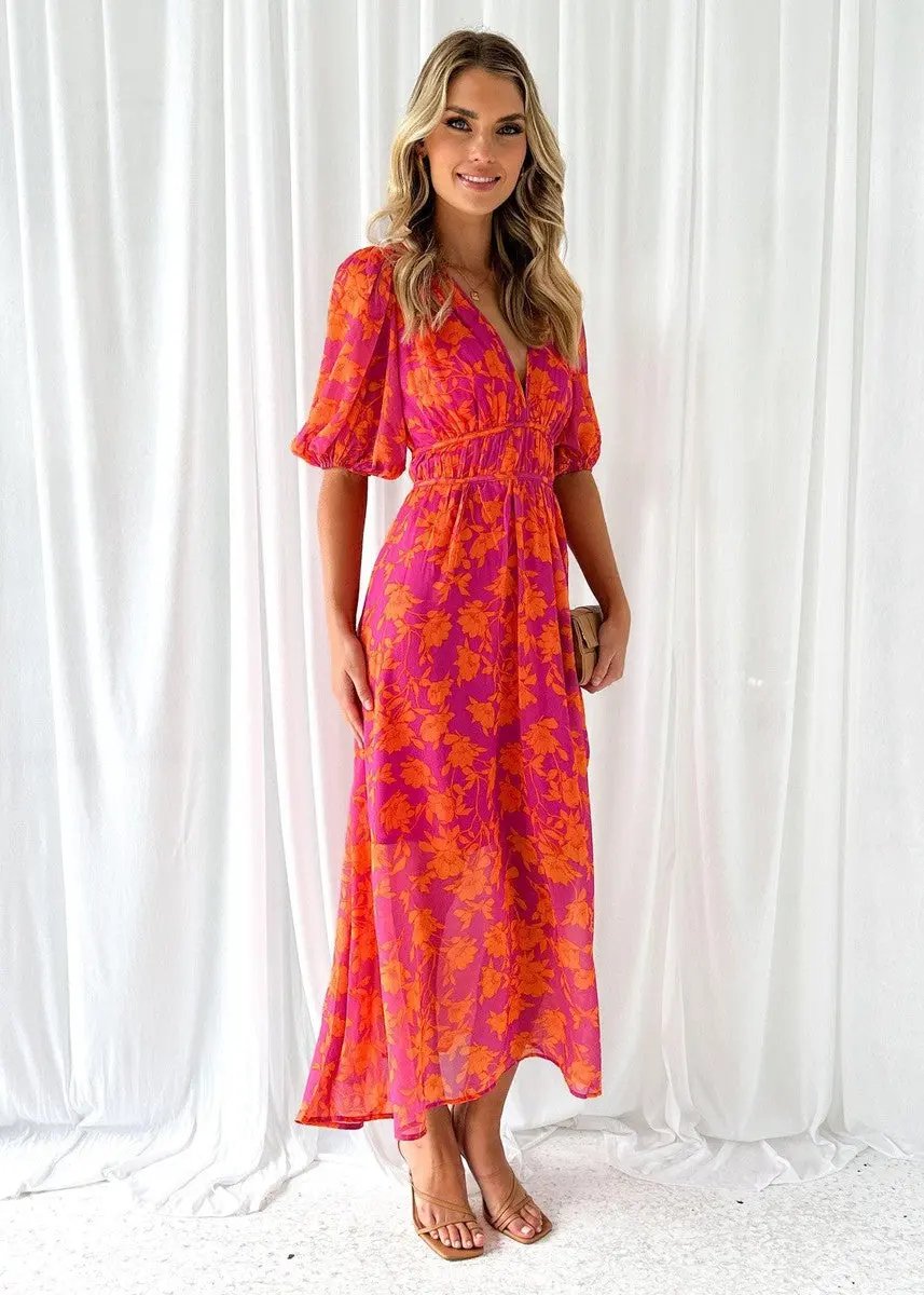 Chic women's puff sleeve midi dress with V-neck, ideal for spring/summer parties. Features an elastic waist.