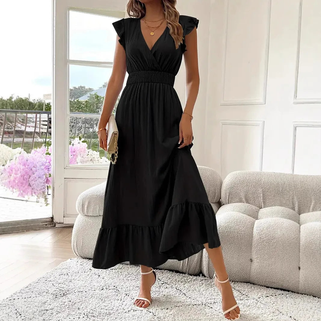Stylish women's V-neck maxi dress with delicate ruffle trim, ideal for versatile spring fashion.