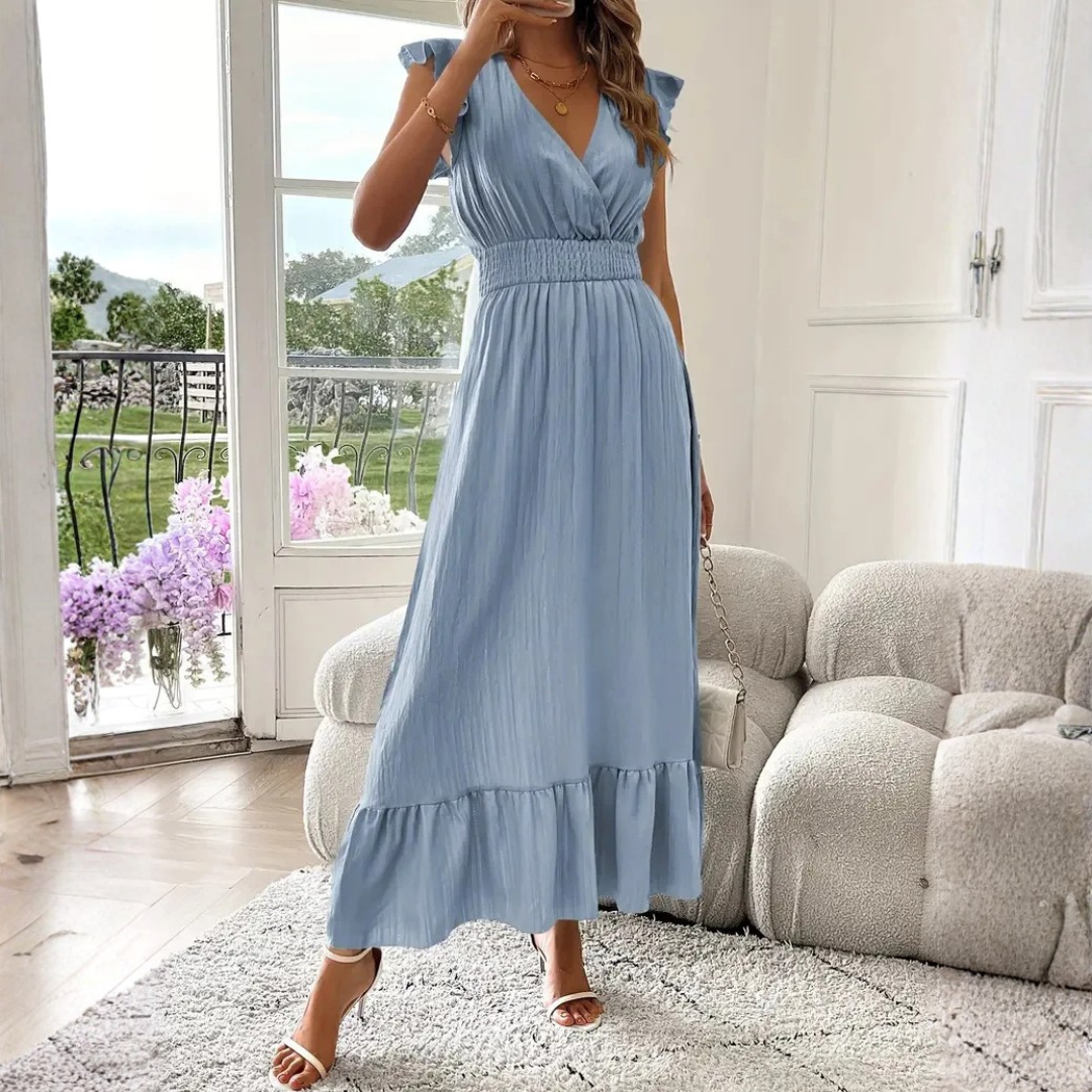 Flowy women's V-neck maxi dress with elegant ruffle trim, suitable for any party or casual outing.