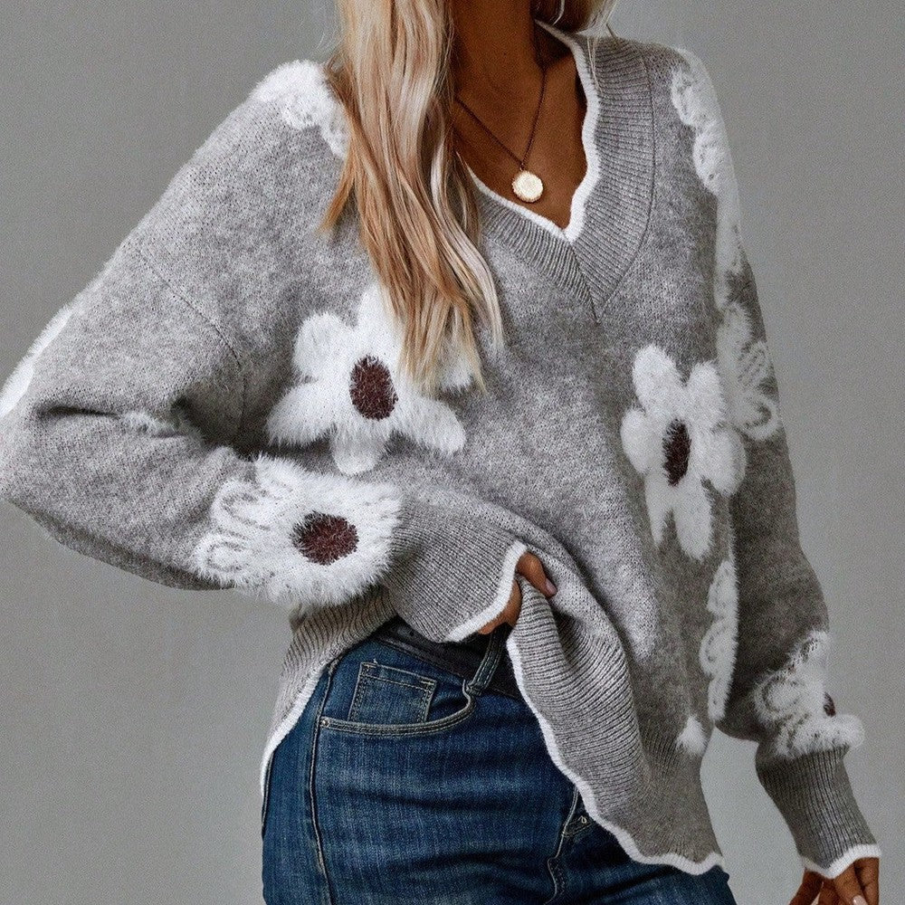 Elegant women's V-neck sweater with a sophisticated floral design, perfect for casual chic autumn fashion.