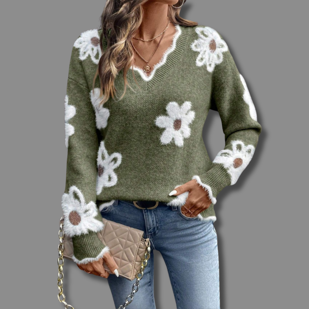 Comfortable women's V-neck sweater with an elegant floral design, a perfect addition to autumn fashion.