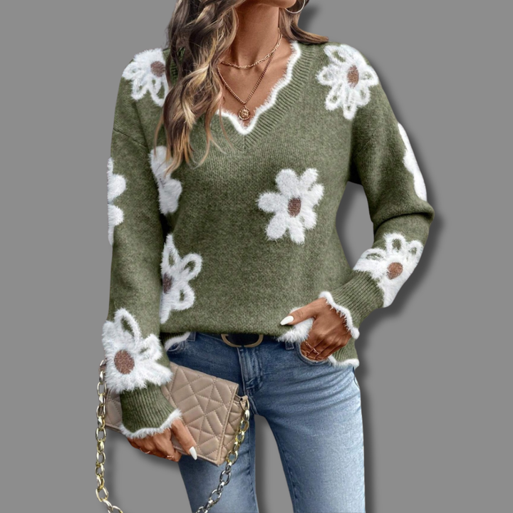 Comfortable women's V-neck sweater with an elegant floral design, a perfect addition to autumn fashion.