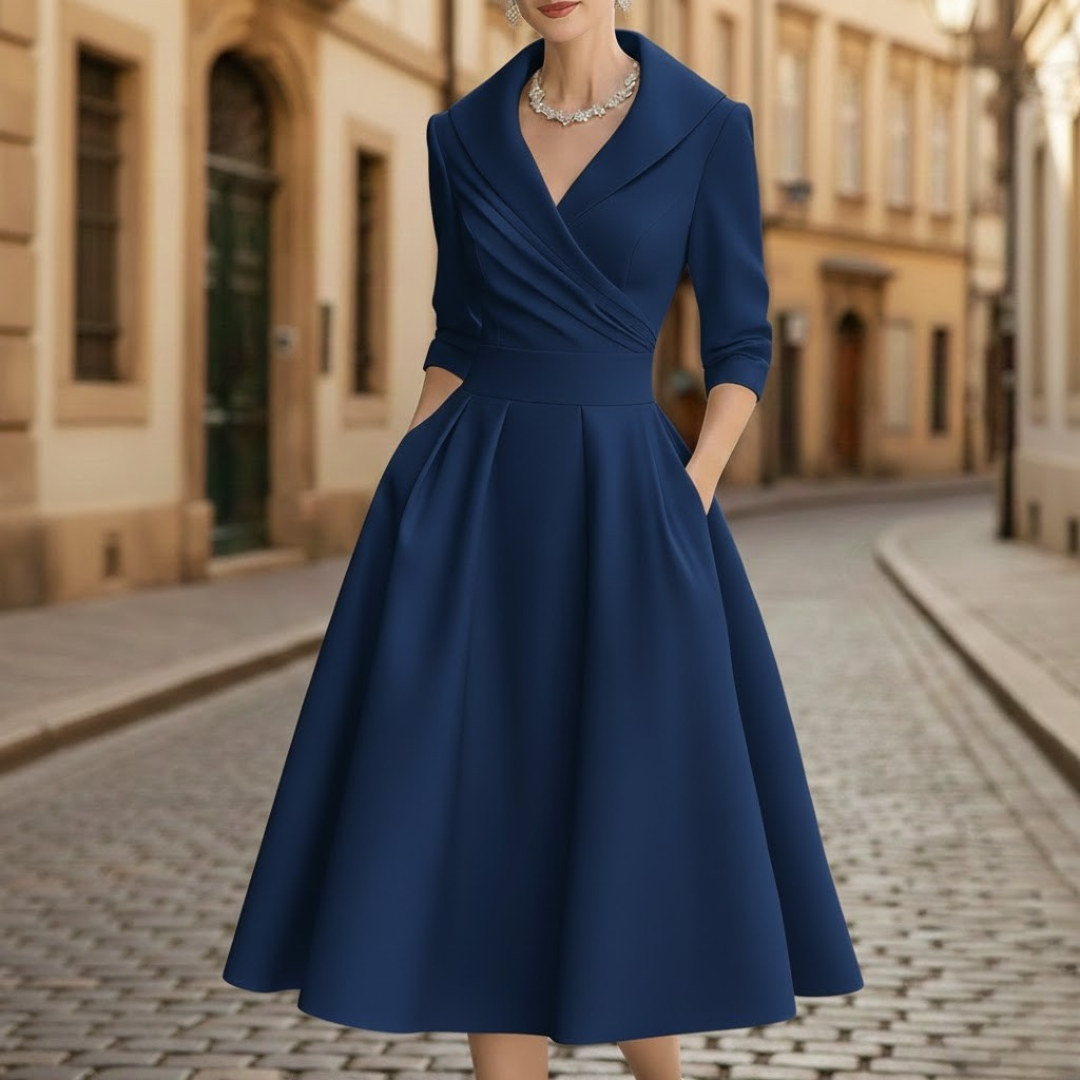 Versatile V-neck midi dress for women, featuring three-quarter sleeves & practical pockets for casual or elegant looks.