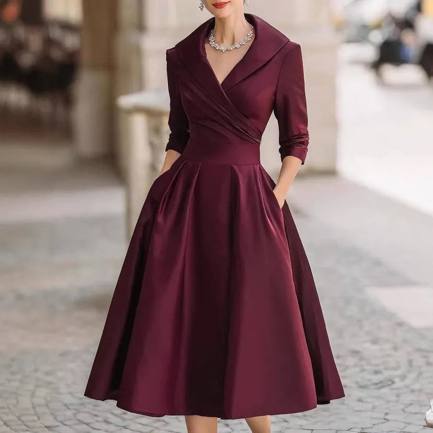 Sophisticated women's midi dress, V-neck, three-quarter sleeves. An elegant choice for any occasion or daily wear.