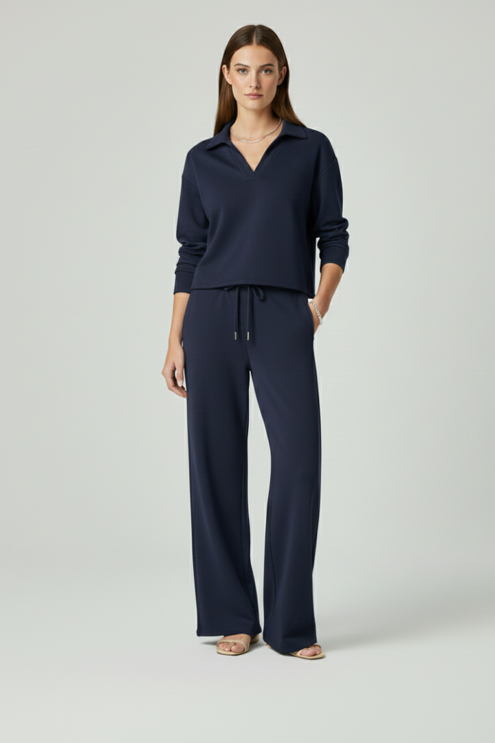 Stylish women's two-piece fashion set with a flattering V-neck top and comfortable wide-leg pants.